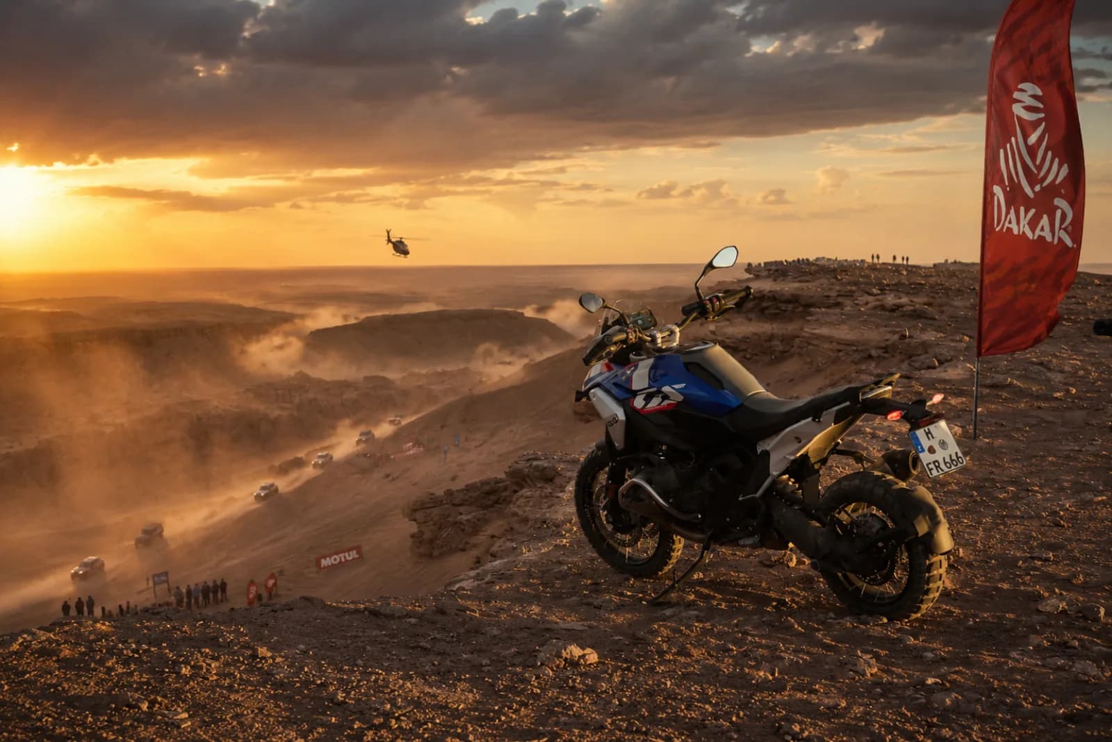BMW GS at Dakar Rally checkpoint at sunset