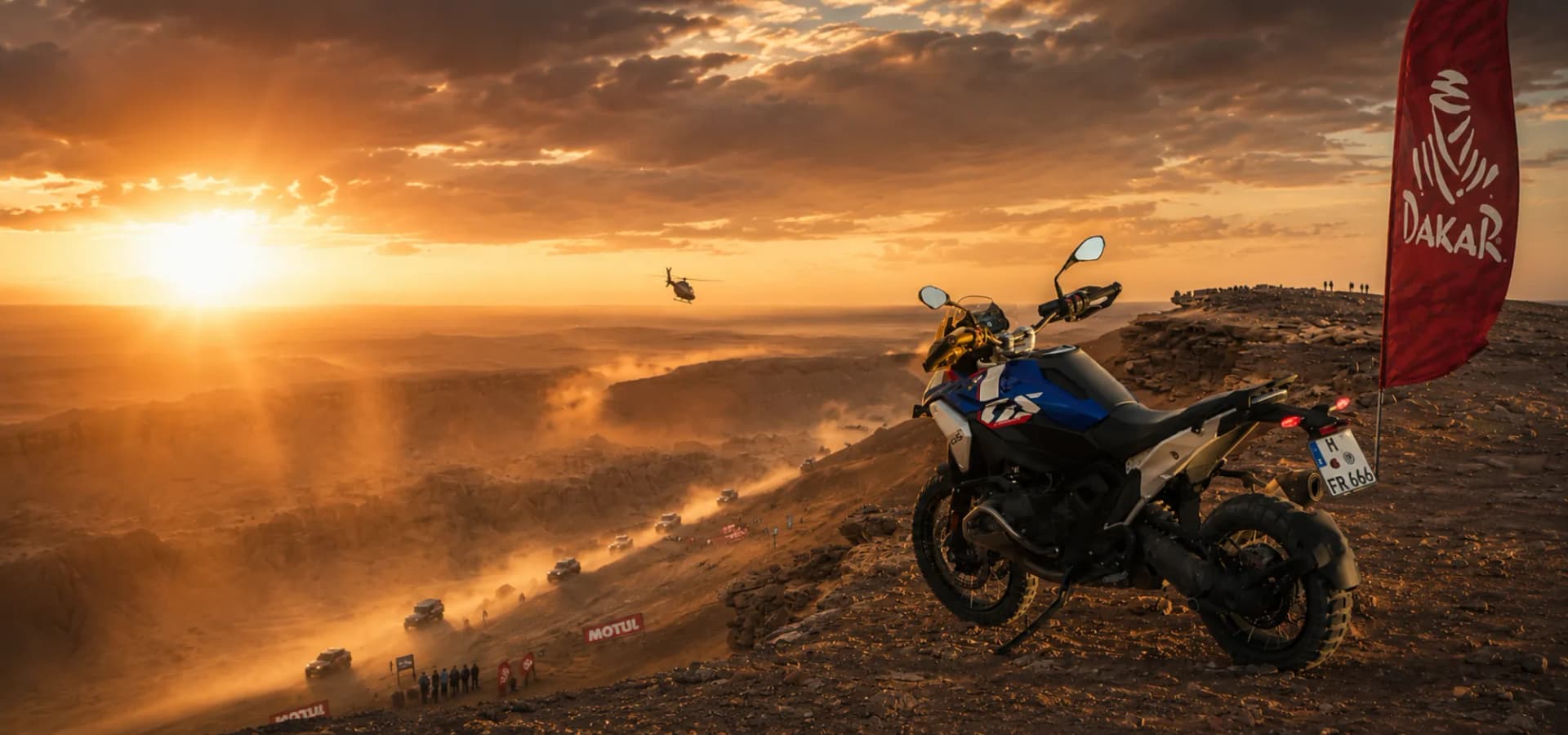 BMW GS at desert rally checkpoint at sunset